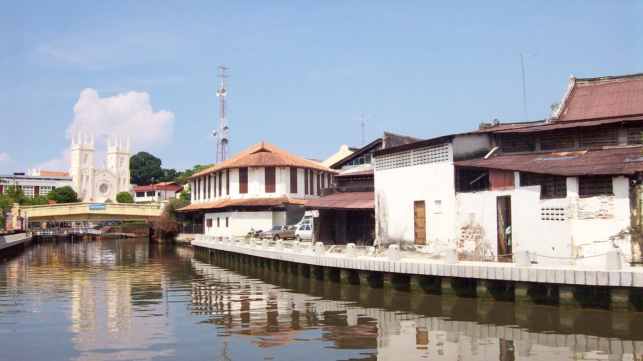 The Melaka River flowing past colourful heritage shophouses in the UNESCO World Heritage city centre