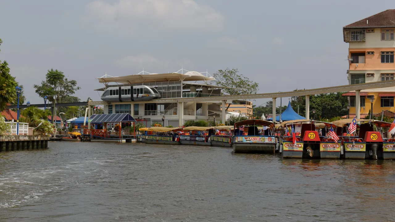 Boats on the Melaka River near Jeti Quayside, setting for the 41st International Dragon Boat Festival