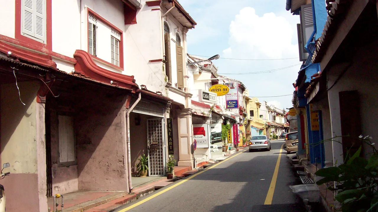 Heritage shophouses lining a quiet street in Melaka's historic old town