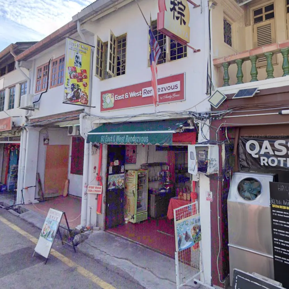 East and West Rendezvous storefront near Jonker Street