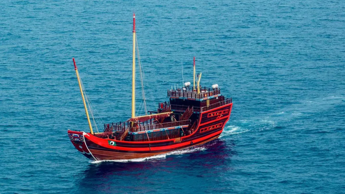 Fu Ning traditional wooden sailboat docked in Melaka