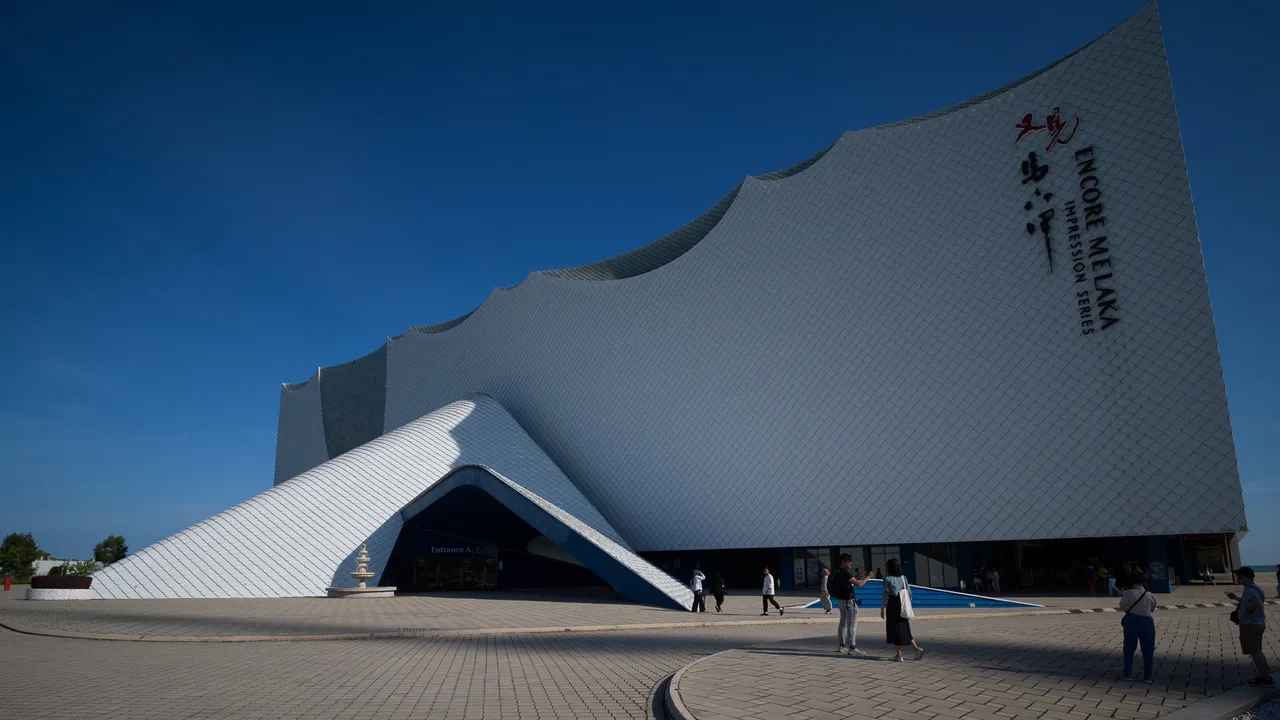 The angular white facade of the Encore Melaka theatre building at Impression City