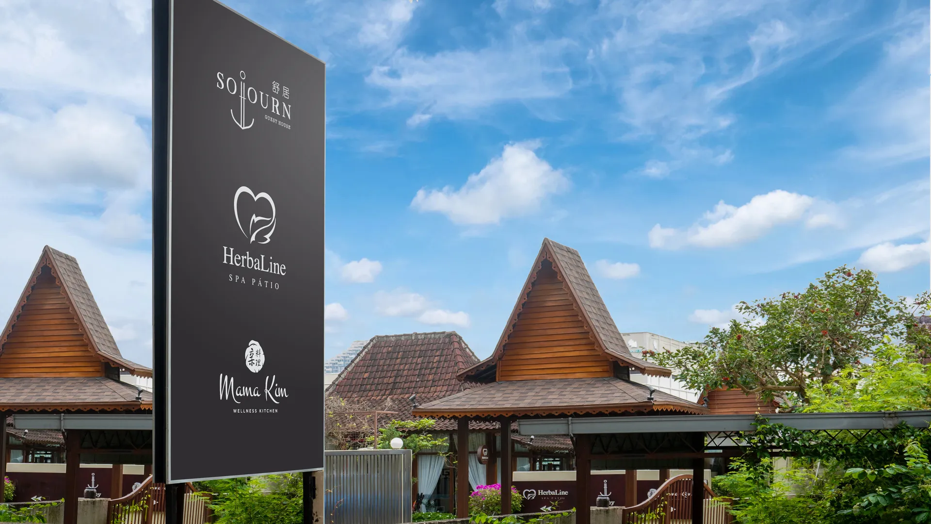 Sojourn Spa Hotel Melaka entrance and traditional timber spa buildings